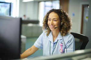Healthcare IT professional replacing aging copper POTS lines with a modern cloud-based communication system