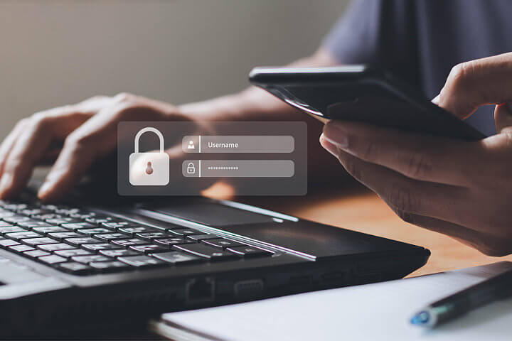 Someone using multi-factor authentication while working online with their VoIP phone