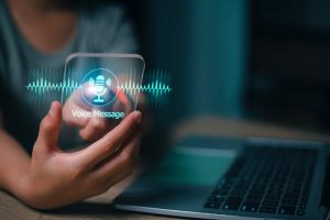 Person clicking on virtual graphic of voicemail to email for small business